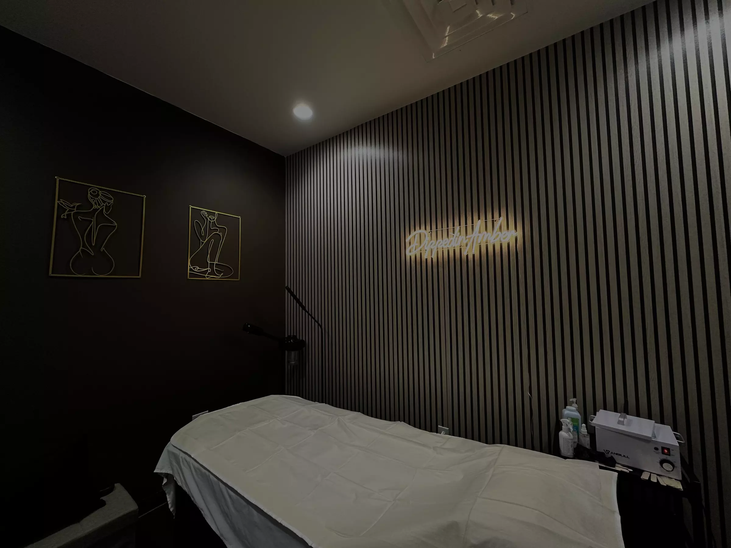 Experience premium waxing at DippedinAmber with Brazilian or Bikini options, using hard wax, up to 32% off. - Primary Image