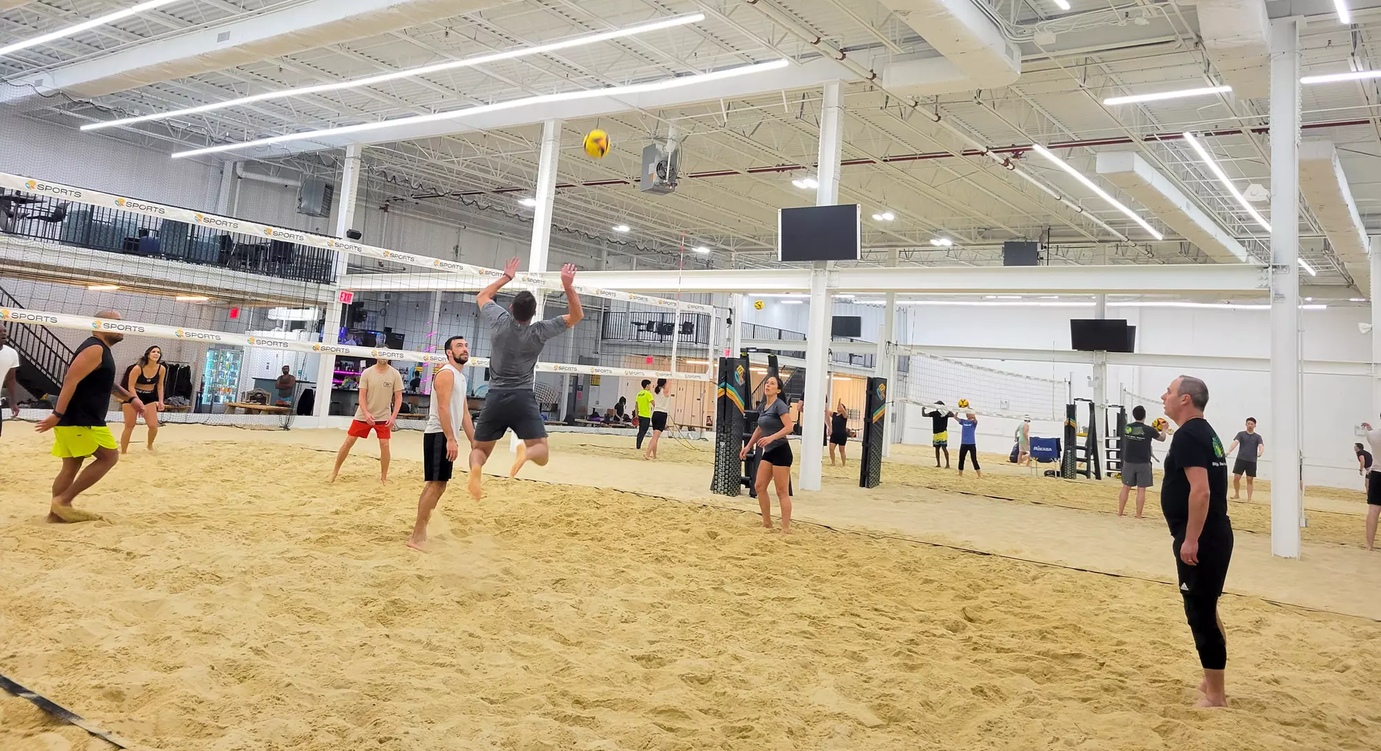 Indoor beach volleyball court rental on Sundays
