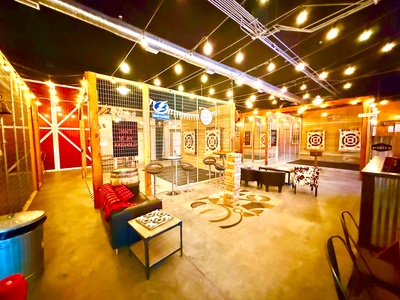 90-Minute Axe Throwing Session for 1 Guest plus 1 Beverage - Tampa Bay Axe Company