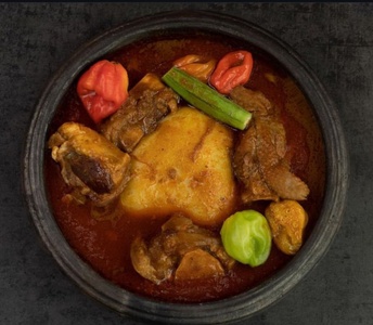 $20 Toward Rice Dishes with Goat, Chicken, Tilapia or Swallows with Soups – Valid for Takeout or Dine-In Where Available - Asantes Restaurant