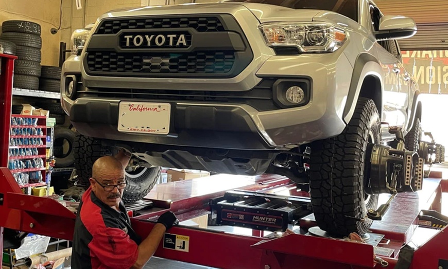 Image 4: Upgrade to a Synthetic or Conventional  Oil Change and Alignment
