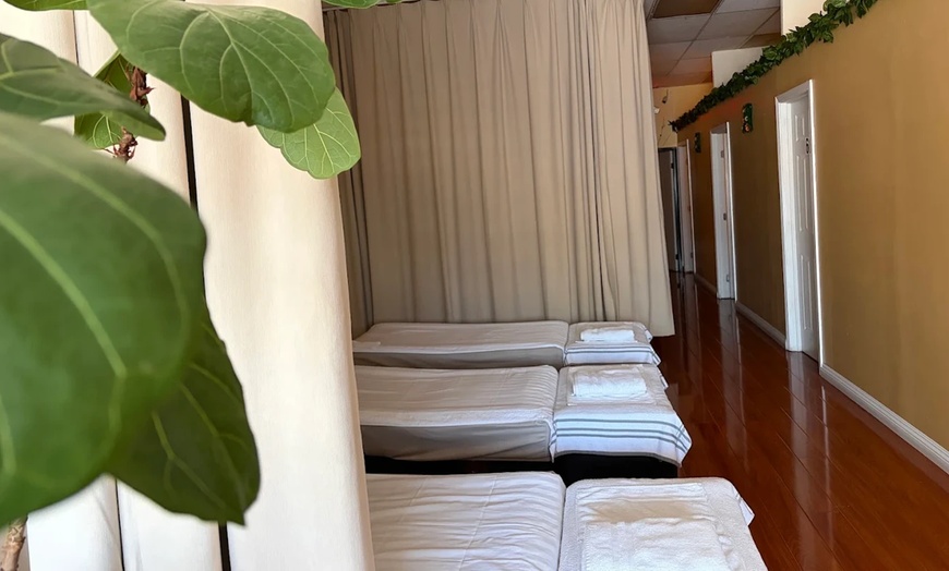 Image 3: Relax and Rejuvenate with a 60-Minute Hot Stone Treatment