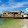 Image 1: 1.5-Hour Tiki Island BYOB Boat Cruise for One Adult or Child