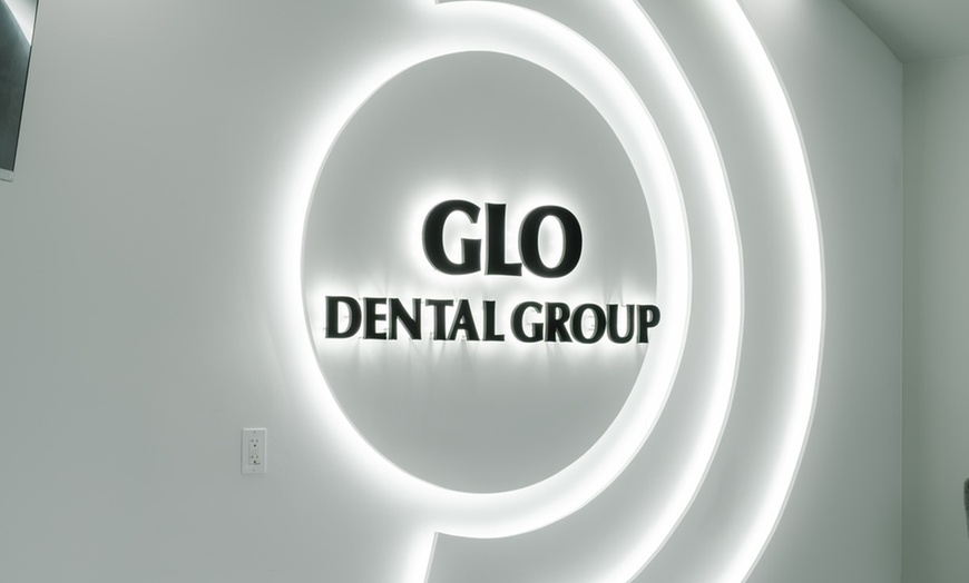 Image 1: Up to 70% Off on Denture Services at Glo Dental Group