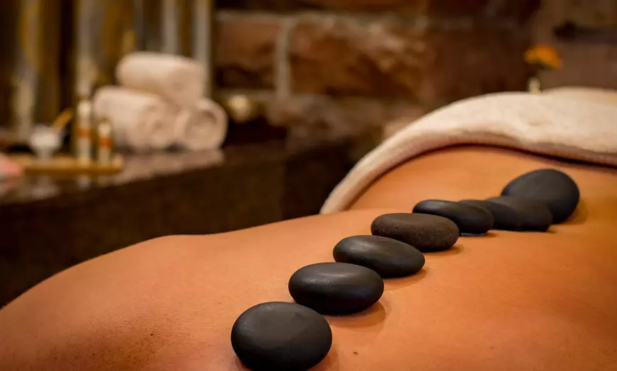 Image 1: 60 or 90 Min Deep Tissue Oil & Hot Stone Massage for One