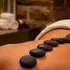 Image 1: 60 or 90 Min Deep Tissue Oil & Hot Stone Massage for One