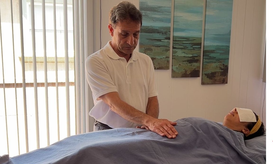 Image 1: Discover Reiki Sessions to Ease Stress and Emotional Pain