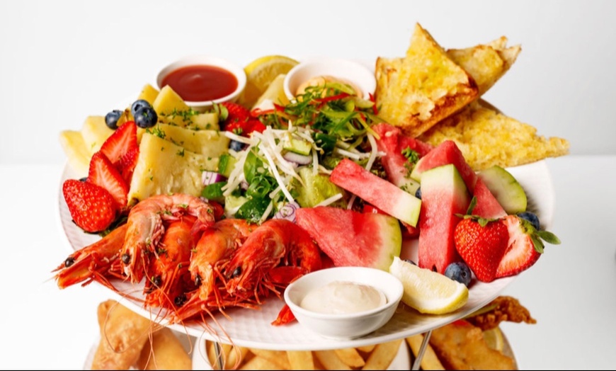 Image 1: Up to 20% Off on Seafood Restaurant at L'Oasis Cafe Bar & Restaurant