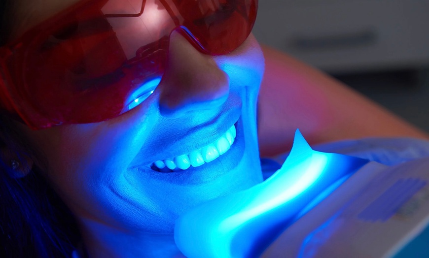 Image 1: Up to 79% Off on Teeth Whitening at B and K Smile Bright Studios