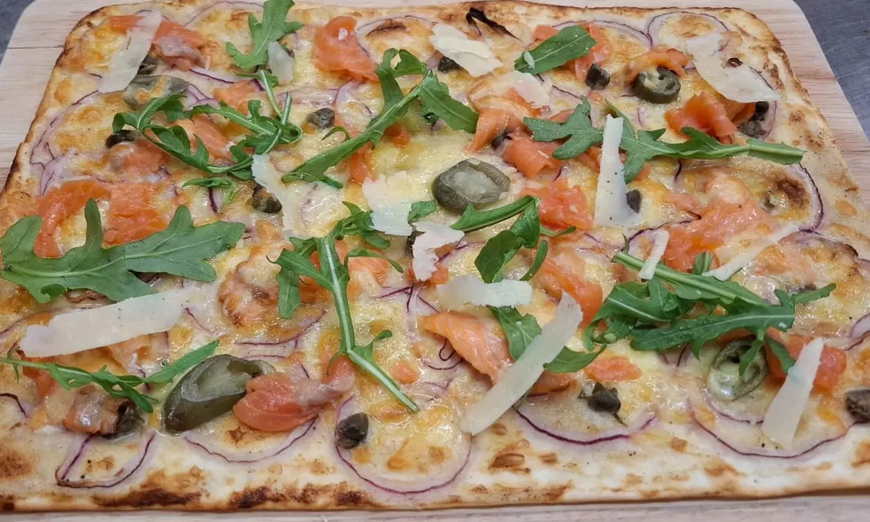 Enjoy a Flavor-Packed Flammkuchen Session for Four or Eight People
