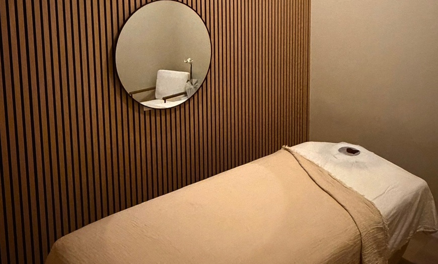 Image 1: Unwind with a 60-Minute Single or Couples Massage Package