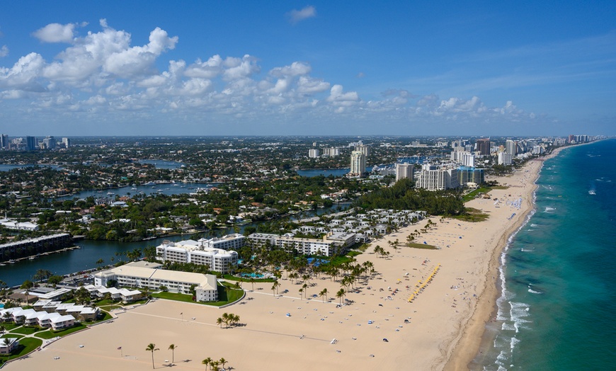 Image 7: Helicopter Tour Over Beaches and Cityscapes