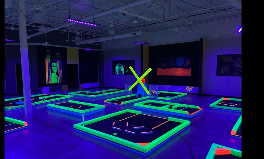 Image 9: Glow-in-the-Dark Mini Golf with Vibrant Challenges – Norman