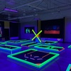 Image 9: Glow-in-the-Dark Mini Golf with Vibrant Challenges – Norman