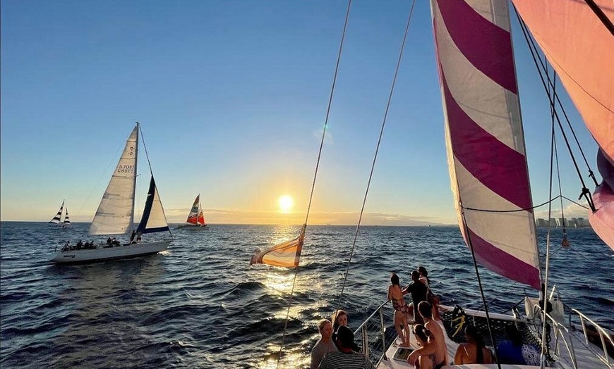 Image 3: Waikiki Snorkel Company offers 1.5 hour cruises for up to four with fireworks and up to 10% off