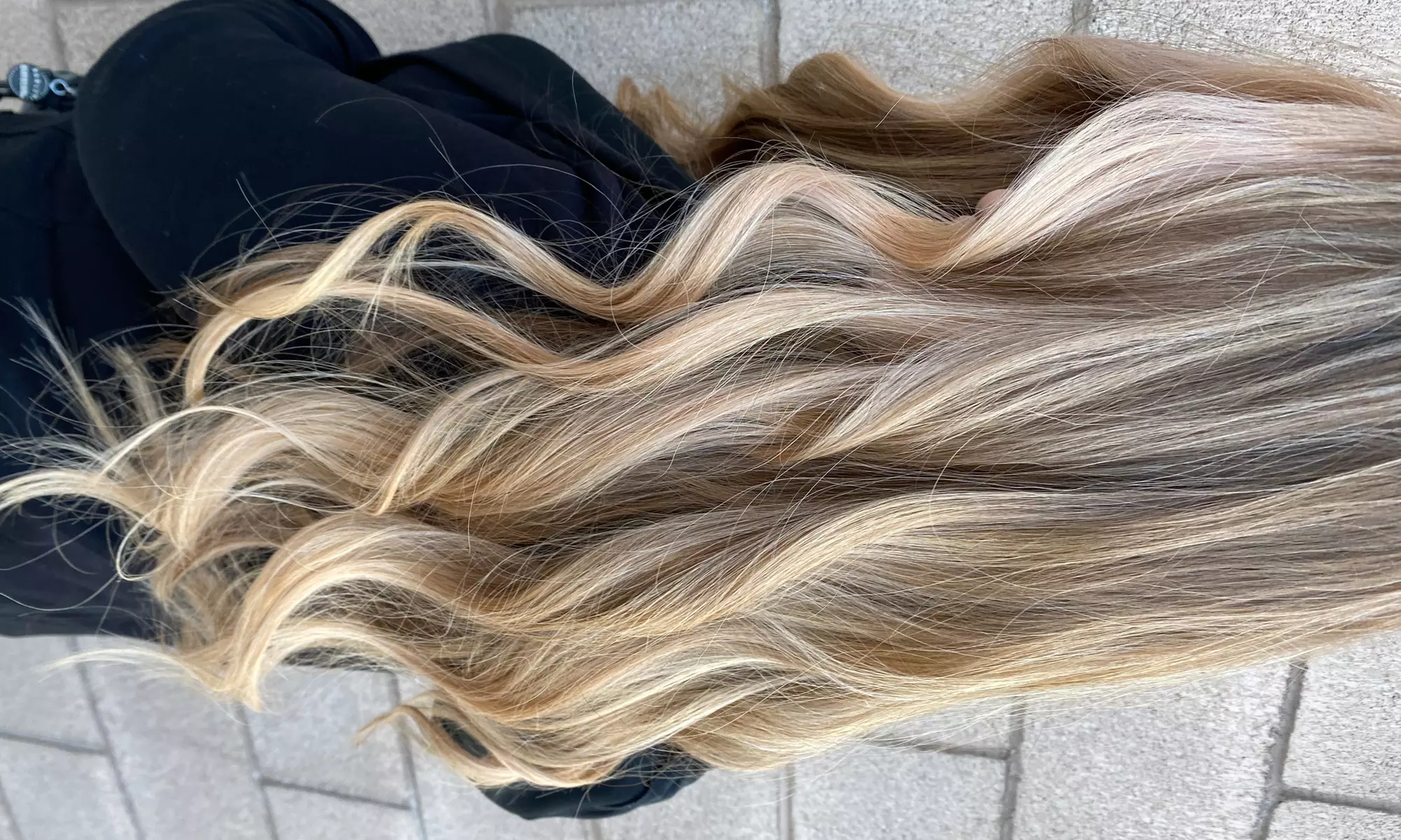 Give a Professional Touch to Hair: Brazilian Blowout or Root Color & Brazilian Blowout Special (Up to 68% Off)