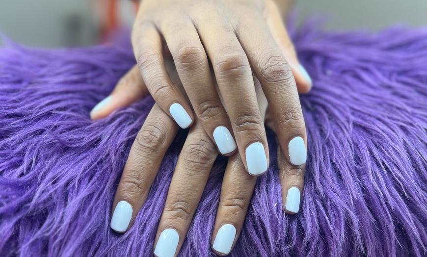 Image 1: Get the Full Works with a Deluxe Mani-Pedi Services! 