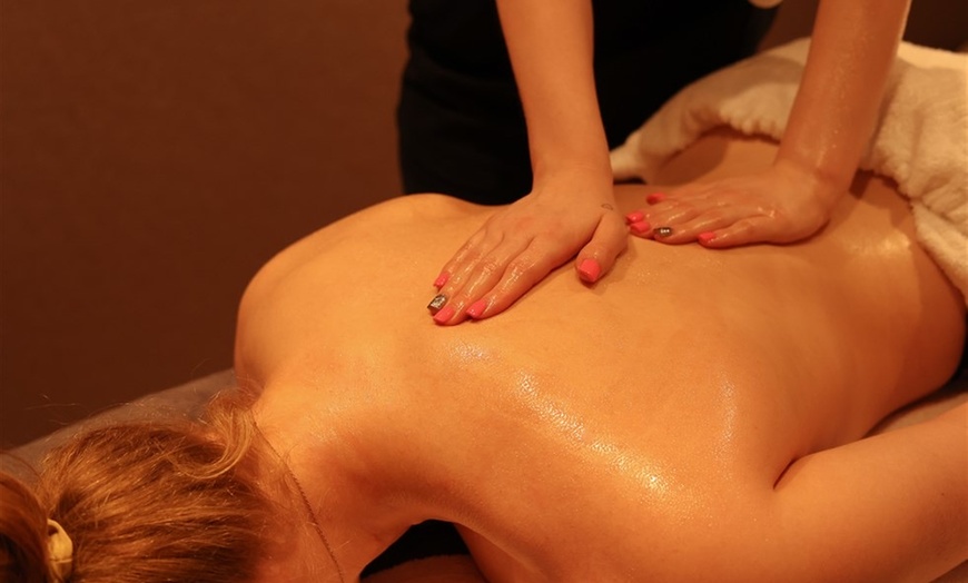 Image 2: Get a 50, or 80 Min Himalayan Salt stone massage w/without Back Scrub