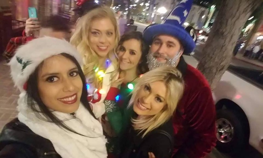 Image 1: San Diego VIP Holiday Tour with LED Robots, Live Performers & Drinks 