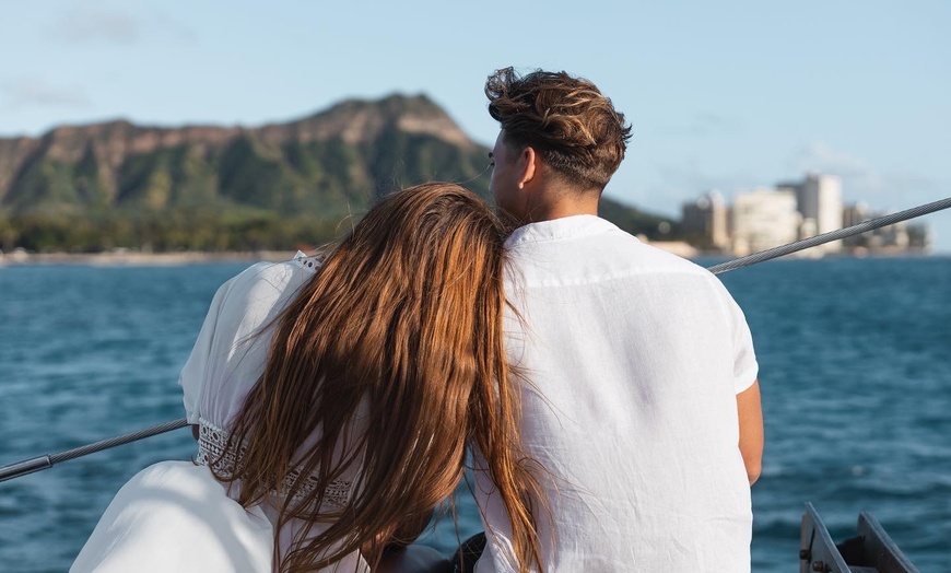 Image 5: Waikiki Snorkel Company offers 1.5 hour cruises for up to four with fireworks and up to 10% off