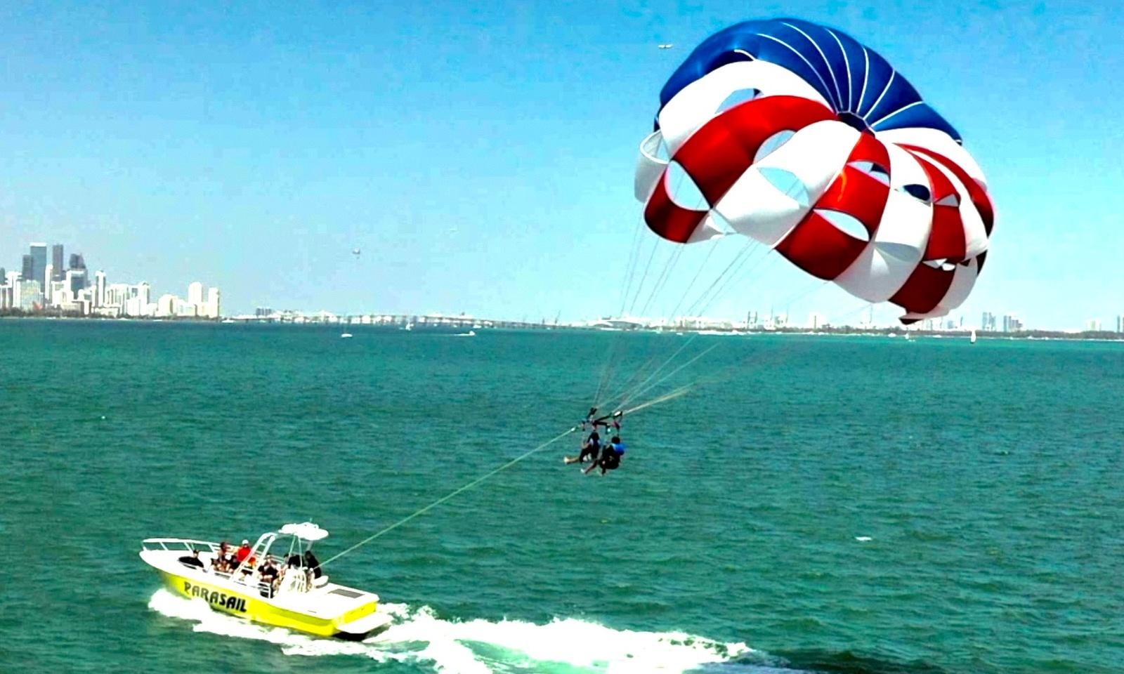 Enjoy Parasailing and Speedboating Adventure 