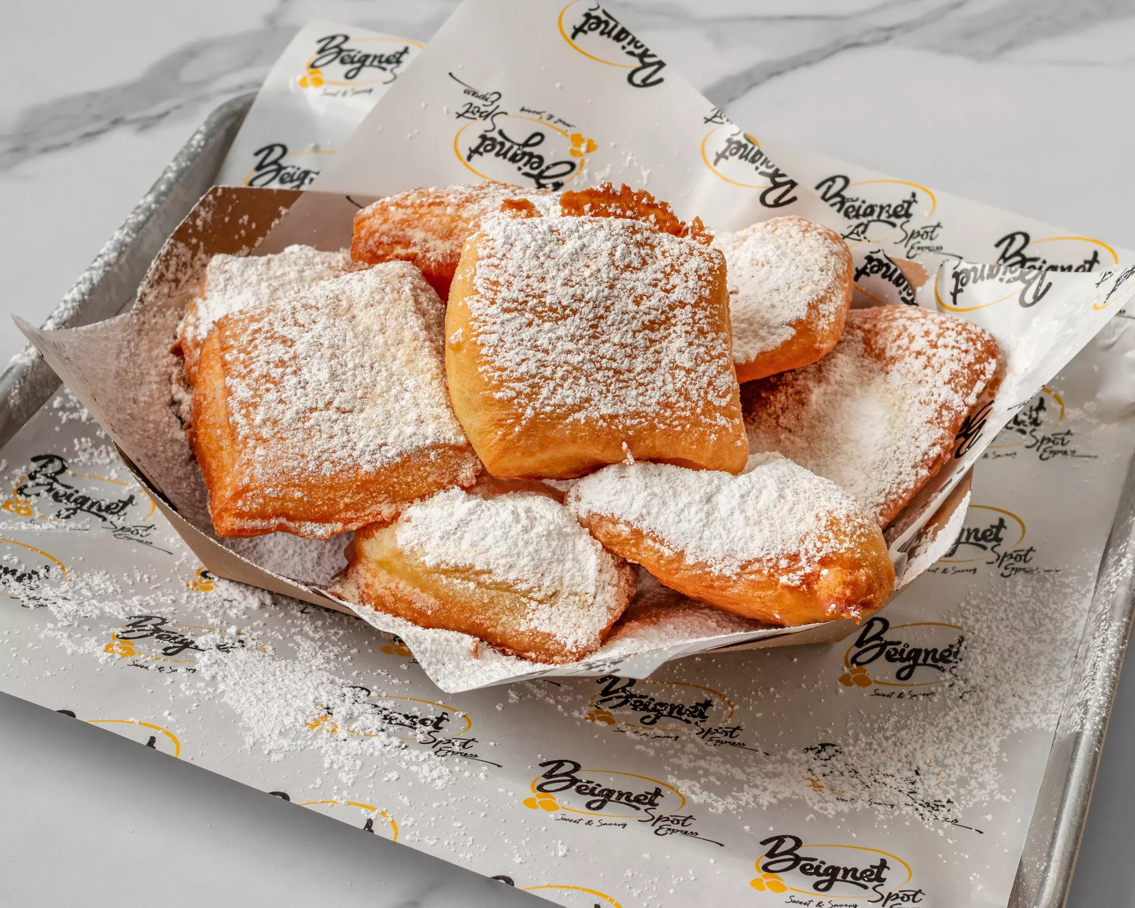 Sweeten Your Day: Indulge in Beignets, Milkshakes, Coffee & Sundaes at Beignet Spot Express (Up to 50% Off) - Second Medium