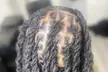 Revitalize with Retwist, Loc detox, Starter locs, and Free style at Melodic Roots & Wellness (Up to 48% Off) - Second Medium
