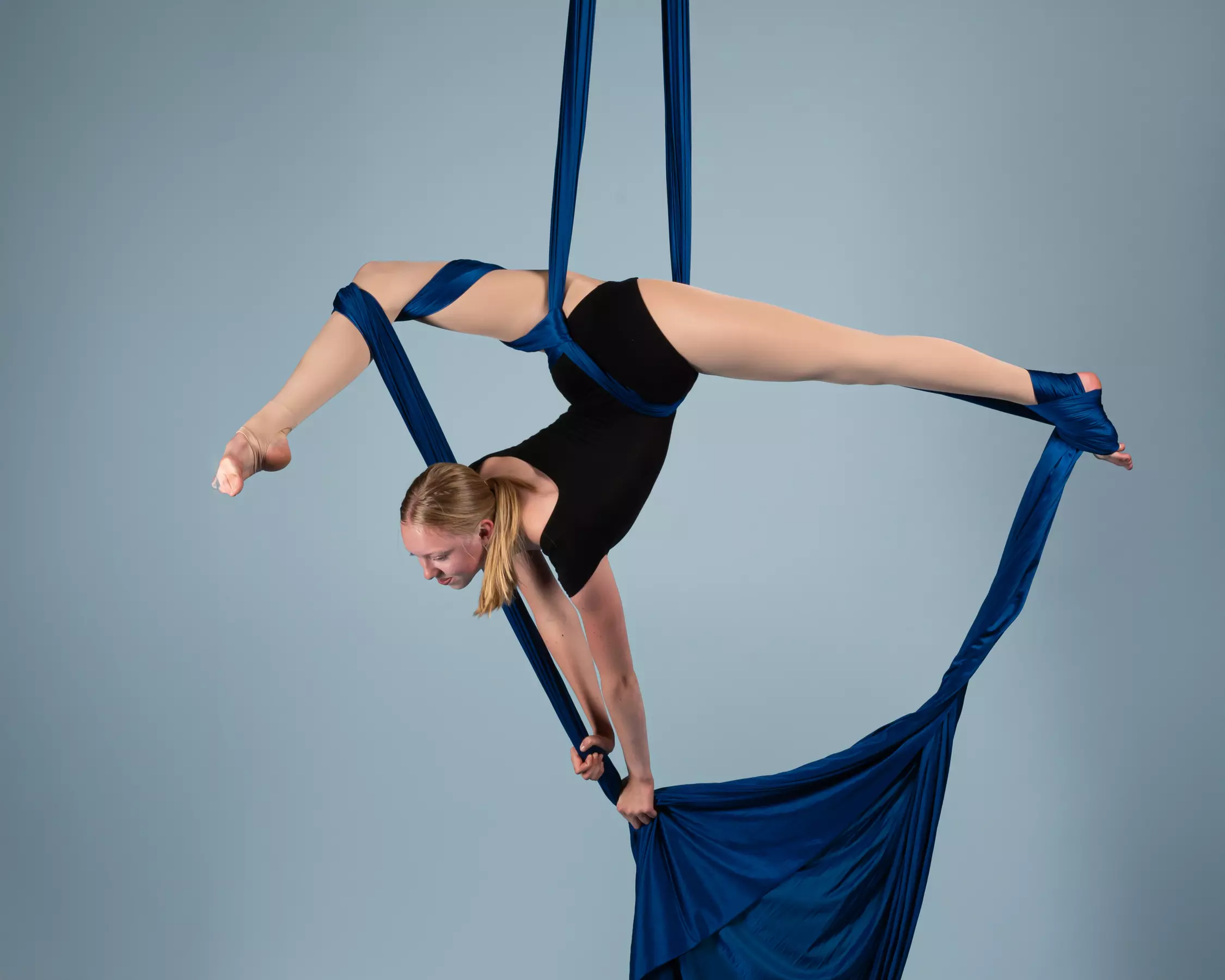 Explore aerial fitness at The Apollo Center with classes for youth and teen/adults, up to 58% off. Discover a unique workout!