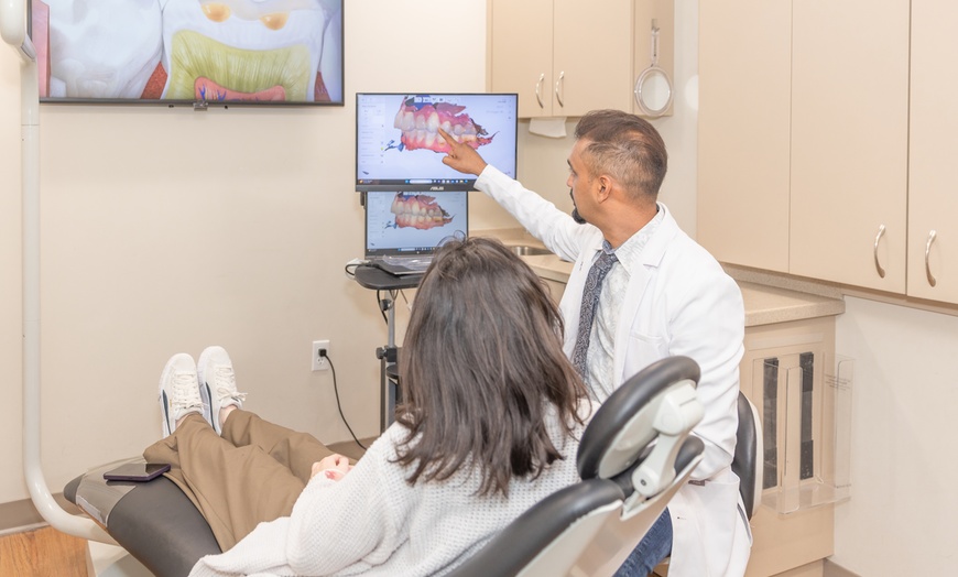 Image 2: Brighten your smile at Dental Care East Hanover with comprehensive exams, cleaning, and x-rays up to 42% off