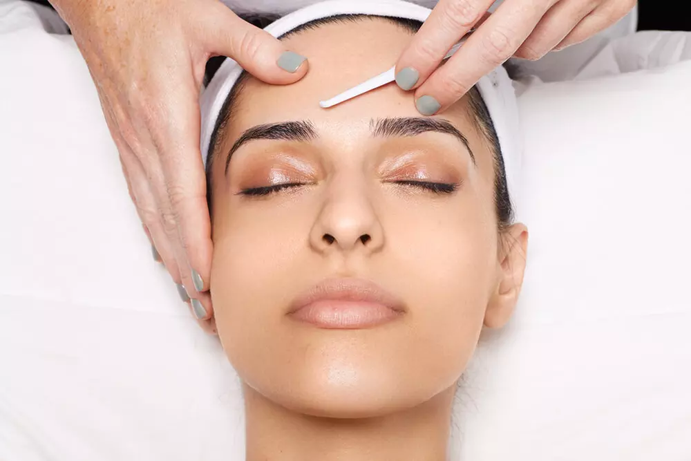 Transform Your Glow with Microdermabrasion or Dermaplaning at Pink Caviar Lash and Brow Spa (Up to 35% Off) - Primary Image