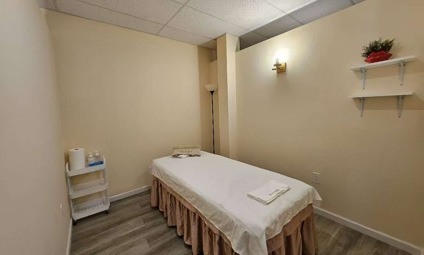 Image 2: Blissful Escape Awaits: Deluxe Bodywork or Foot Reflexology Package 