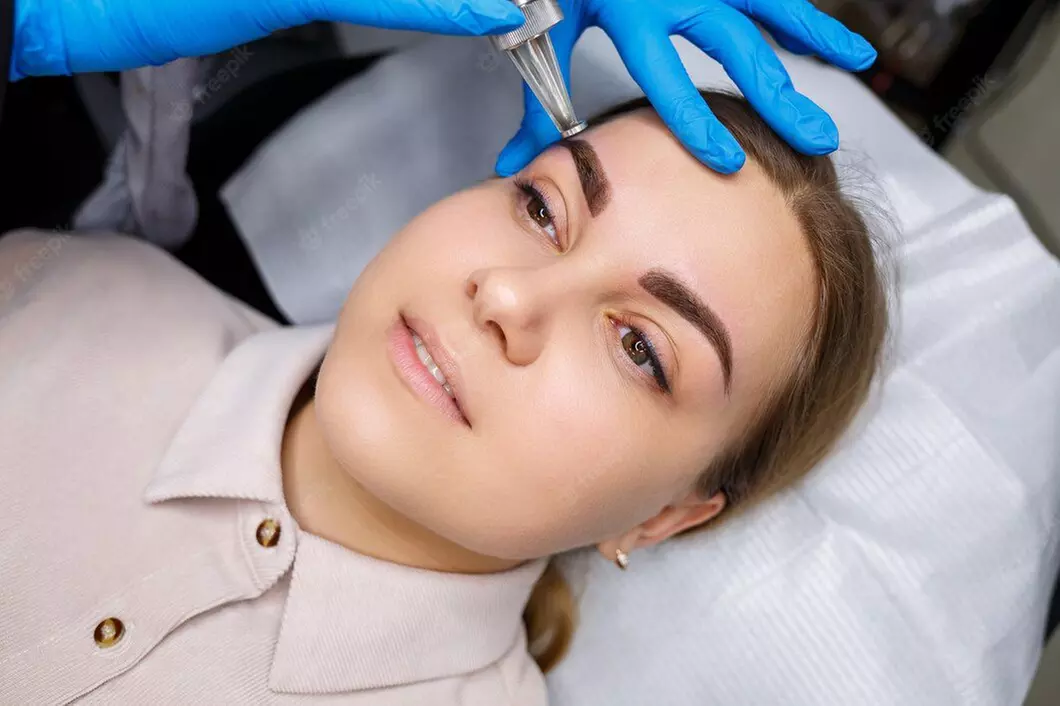 Get One or Three Sessions of Eyebrow Laser Tattoo Removal at Sugarlime Wax and Sugaring Studio, save up to 55% - Primary Image