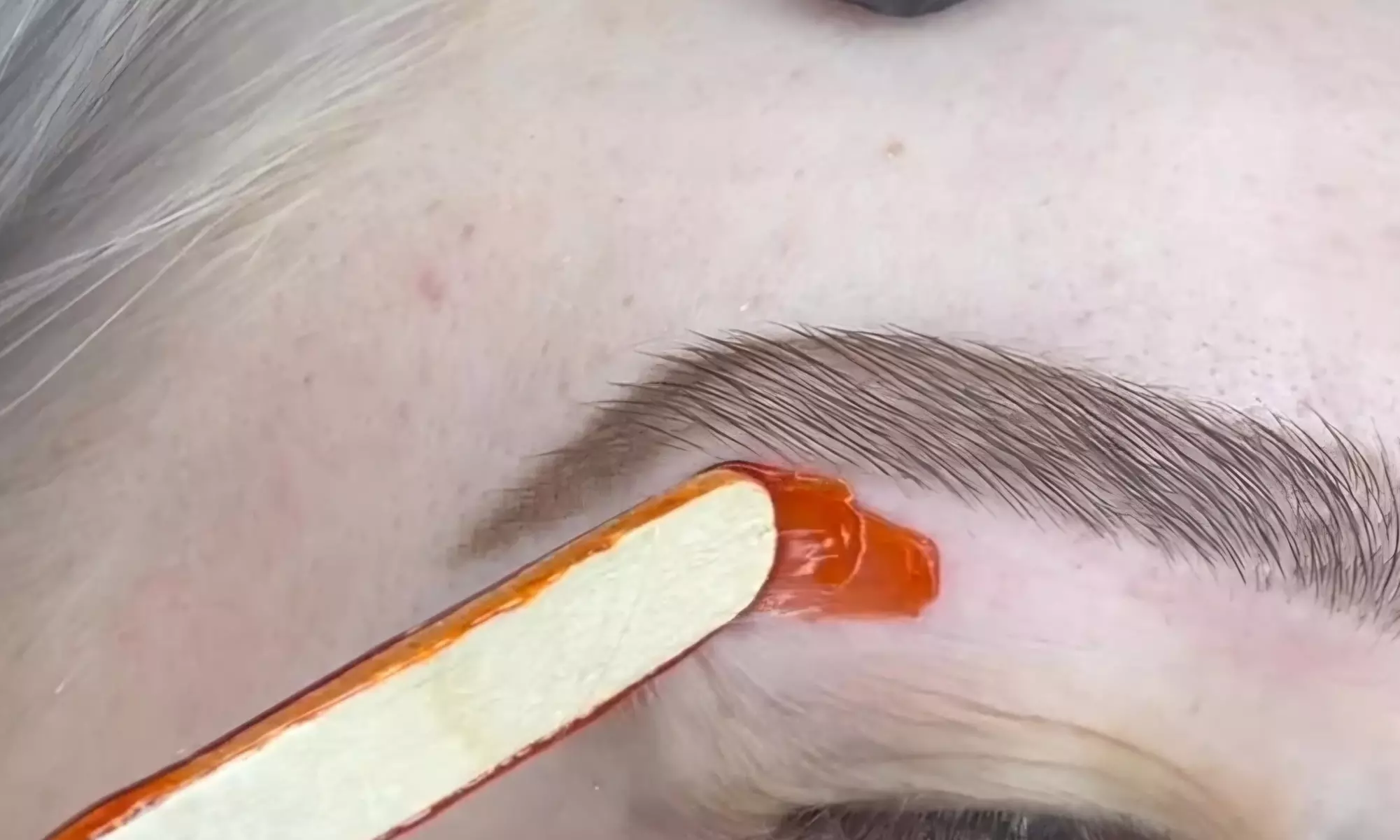 Smooth Skin with One or Three Brazilian, or Eyebrow Waxing Sessions