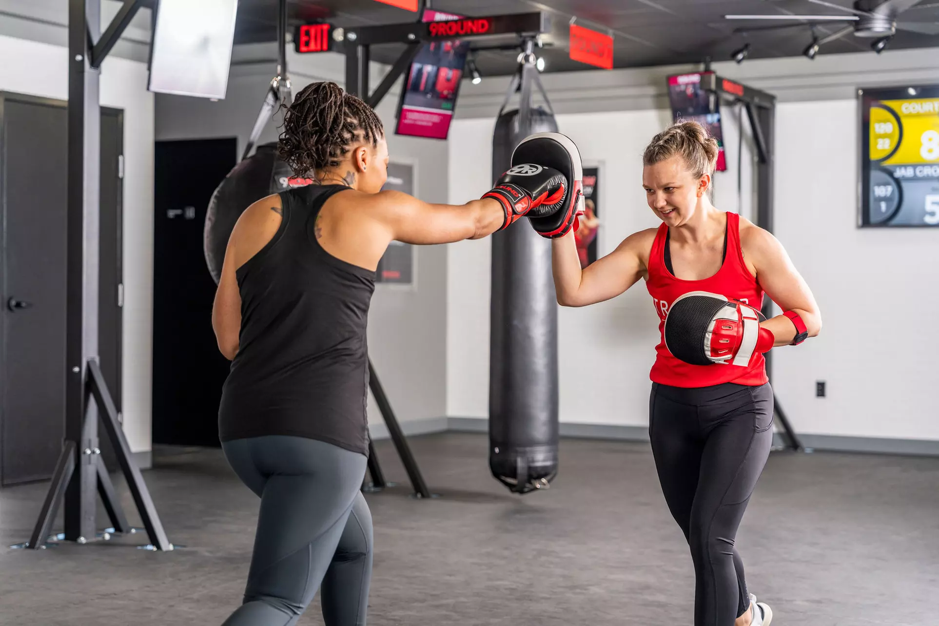 Discover personalized kickboxing lessons at 9Round Fitness Leander Up To 50% Off - Second Medium