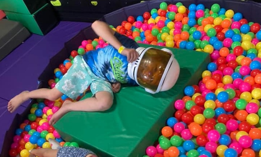 Image 3: All-Day Swim and Arcade Access for Two or Four with Optional Drinks