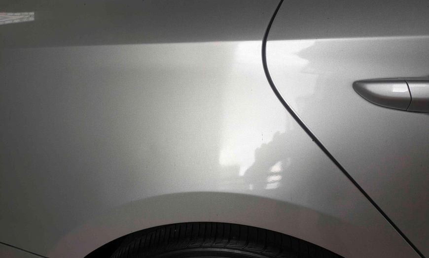 Image 4: Paintless Dent Repair Credit for Vehicle Dent Restoration