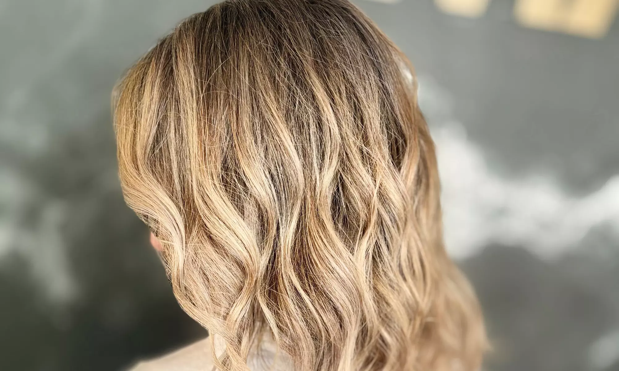 Transform Your Look with a Woman's Haircut, Color, Style