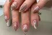 Full Acrylic or Gel New Set w/ Design or Deluxe Gel Mani and Pedi at TANYA BEAUTY (Up to 54% Off) - Second Medium