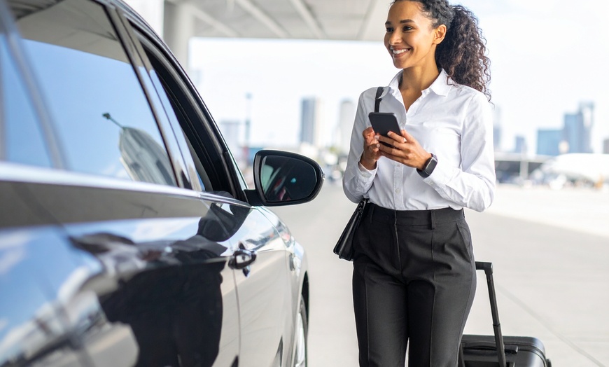 Image 2: Stress Free Travel with Our Black SUV Service