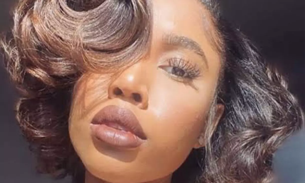 Silk Press with Trim or Tape-in or Microlinks Extensions at The Beautii Bar Salon & Boutique (Up to 46% Off) - Primary Image