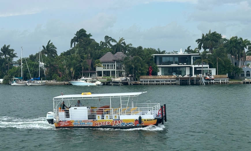 Image 4: Locals Ride the Water Taxi Miami Between Miami Beach Marina and Downtown (Bayside Marketplace) (Up to 75% Off)