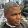 Image 3: Refined haircuts and traditional grooming services