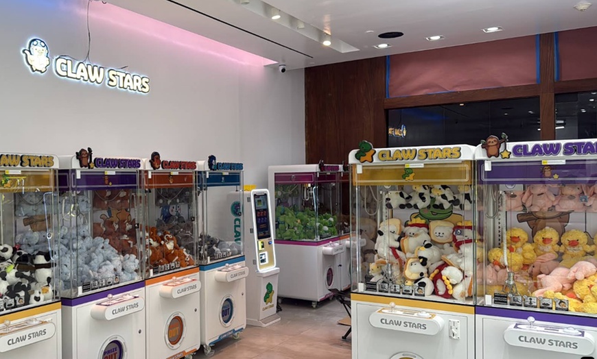 Image 2: 20 or 50 Claw Machine Tokens and Plushie Prize Packages for All Ages