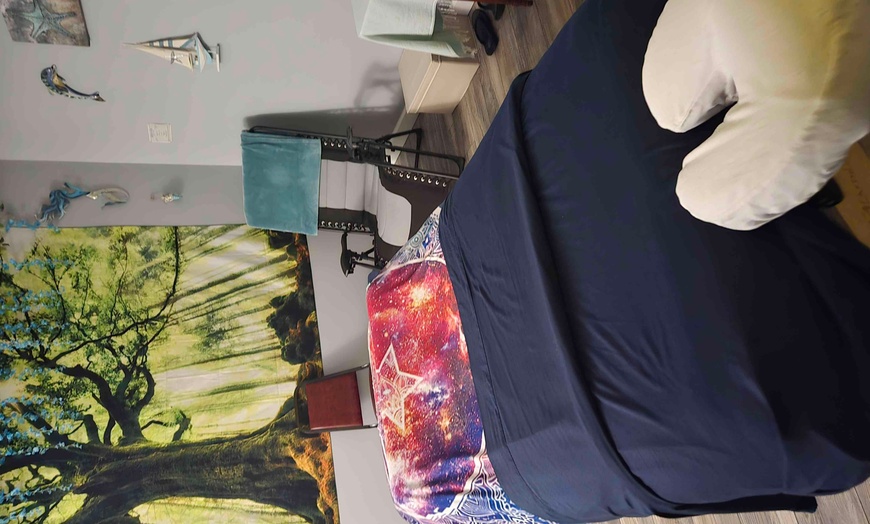Image 1: Up to 47% Off on Swedish Massage at RejuviSpa