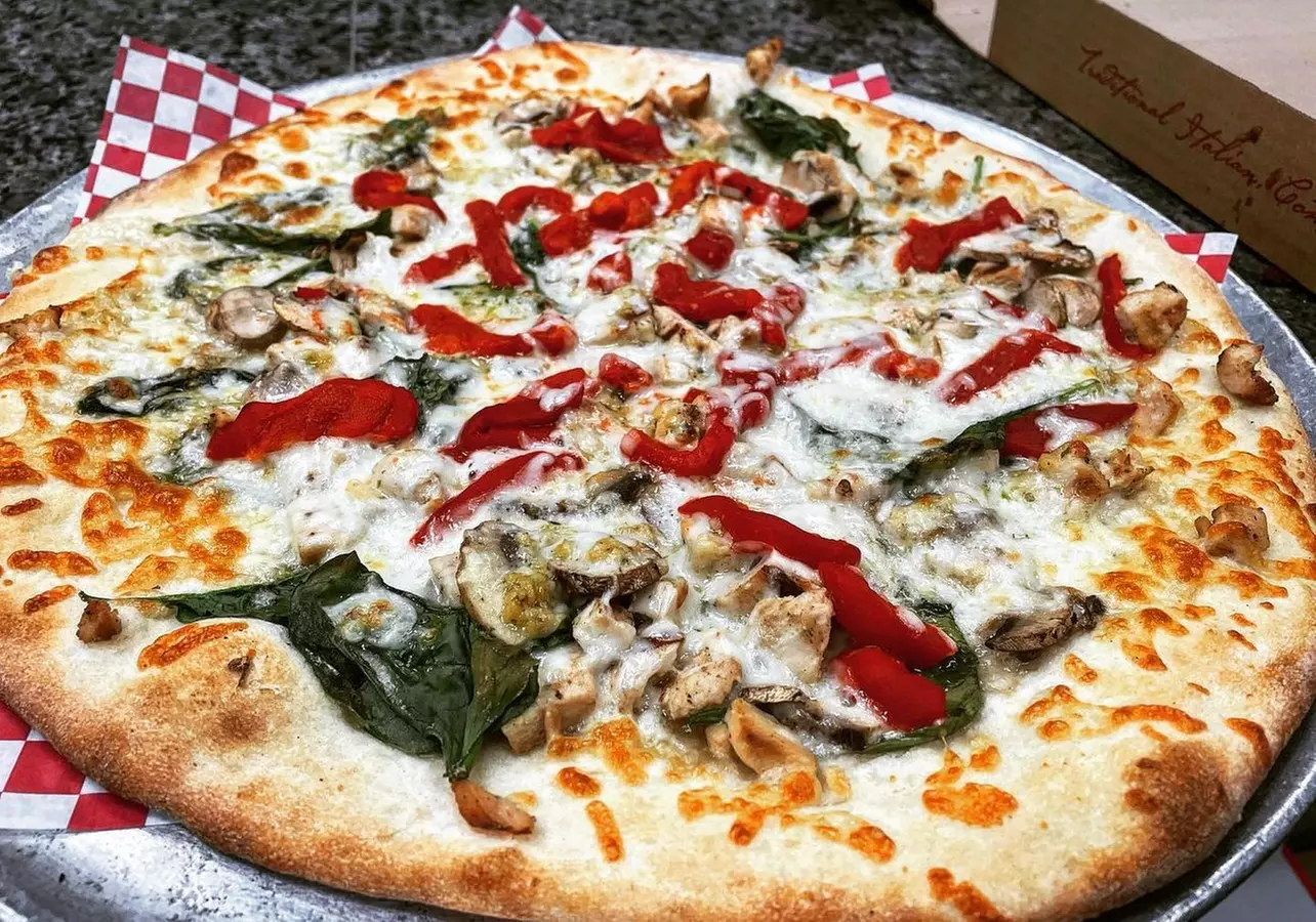 Savor Pizza and More with $30 Or $50 Worth Of Food Vouchers at Station Pizza - Second Medium