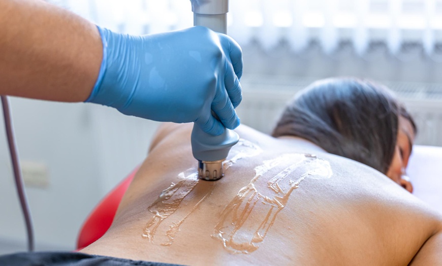 Image 2: Shockwave Treatment and Pain Consultation: 1 or 5 Pack