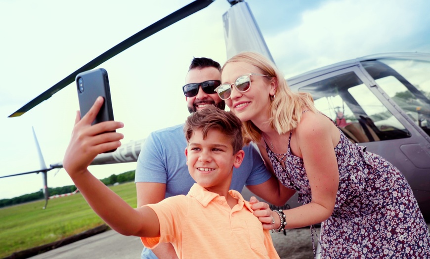 Image 1: 8 to 10 Minute Helicopter Tour for Up to Three People in Central Florida