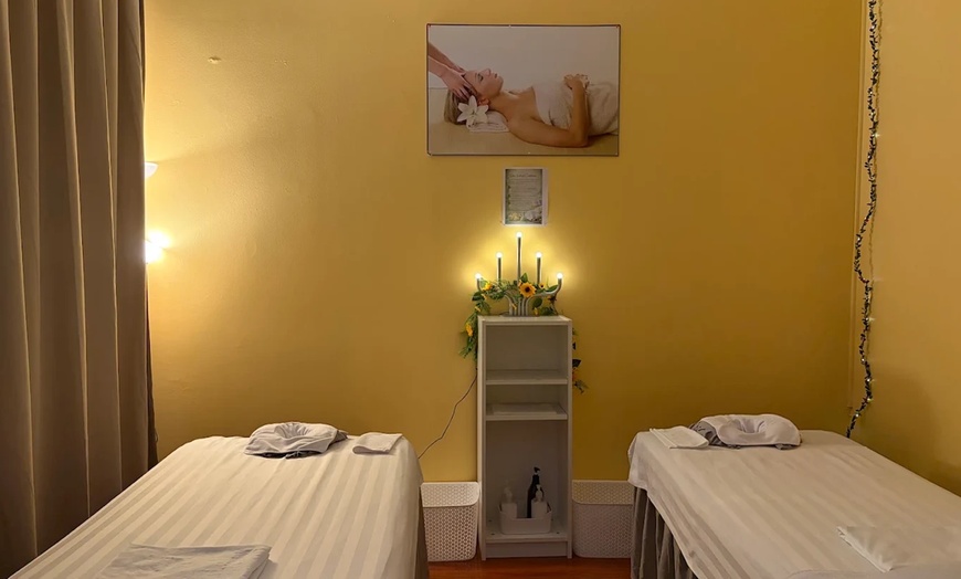 Image 2: Relax and Rejuvenate with a 60-Minute Hot Stone Treatment