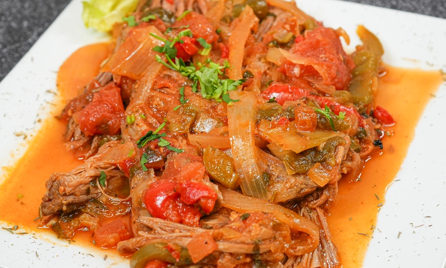 Image 13: Enjoy American-Colombian Dishes with Up to $150 Towards Food & Drinks