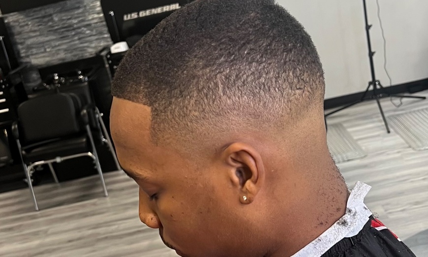 Image 4: Refined haircuts and traditional grooming services